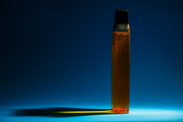 bottle with cream, shampoo for hair, shower gel, colored background, beautiful studio light, beauty and youth of the human body