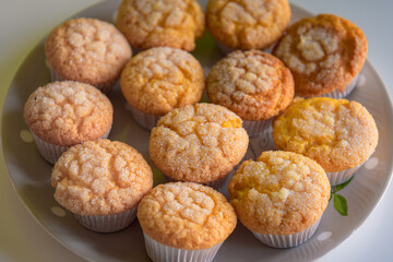 Home baked sugar coated muffins on a plate