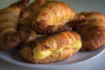 Home baked croissants filled with custard cream