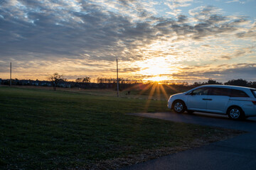 Fototapeta na wymiar car on the road at sunset