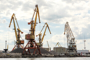 Fototapeta na wymiar Port cranes in the port