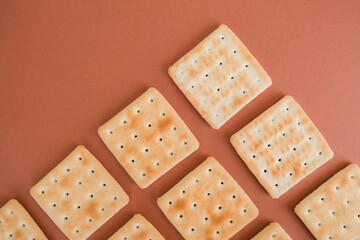 Baked cookies or crackers. Snacks concept. Food background.