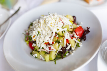 vegetable salad with grated cheese