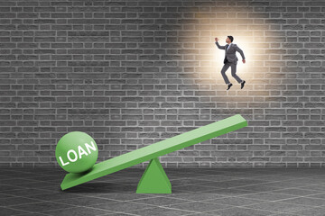 Debt and loan concept with businessman and seesaw