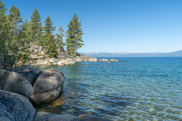 harbor and rocky shoreline at the lake