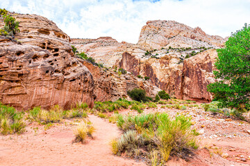 Red orange rock formations landscape view near grand wash parking area in summer in Capitol Reef National Monument in Utah