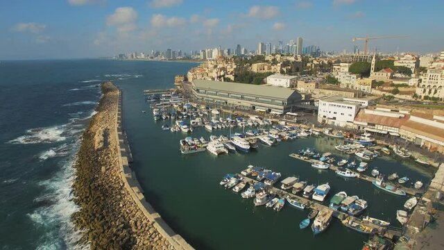 Tel Aviv Jaffa, Aerial View, Flying Over Old Jaffa Port and Saint Peter's church At Golden Hour, Tel-Aviv Skyline and the Mediterranean Sea, Israel - fly  over