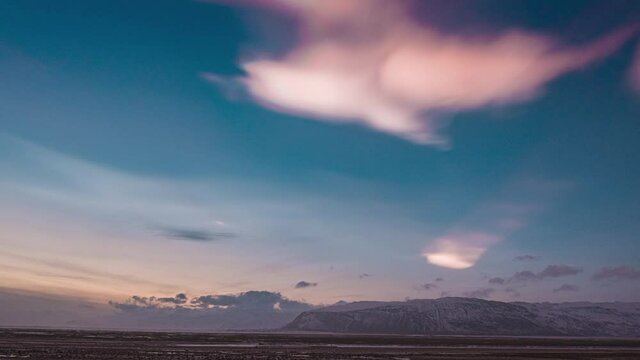 Polar Stratospheric Clouds During Sunset Over Vatnajokull Glacier Cap In South Iceland.  - timelapse