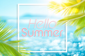 Fototapeta na wymiar Hello summer words on blur tropical beach with bokeh sunlight wave abstract background. Summer vacation and travel holiday concept.