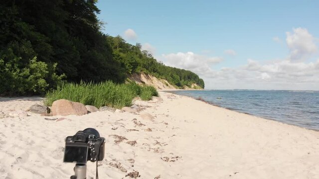 Beautiful beach in northern Germany, Schleswig-Holstein called Noer Beach on the Baltic Sea.
Filmed a camera on a camera tripod.
Drone flies over the camera tripod.