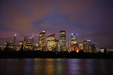 Fototapeta na wymiar Night view of Sydney skyline and Circular Quay Australia