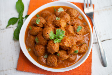 Vegan curry roast healthy soy meat, chunks, ball. Masala Soya Chunk Curry made using Soyabean nuggets and spices - protein rich food from India