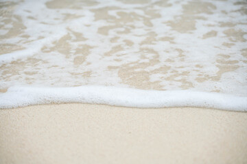 Sea wave bubble On the white sand beach