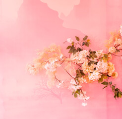 Cherry blossoms texture background for wedding scene. Artificial flowers on the wall