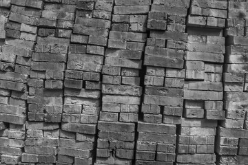 Monochrome image of a stack of bricks