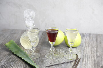 Carafe and wine glasses with liquor