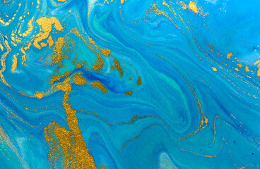 Fototapeta na wymiar Marbled blue and gold abstract background. Liquid marble pattern.