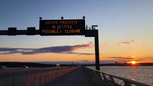 Sign on 520 bridge warning about protest in Seattle