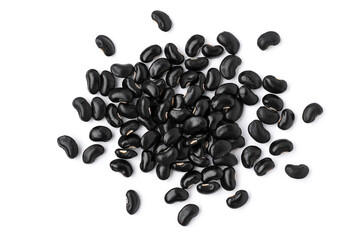 Pile of black beans ( Urad dal, black gram, vigna mungo ) isolated on white background . Overhead view. Flat lay.