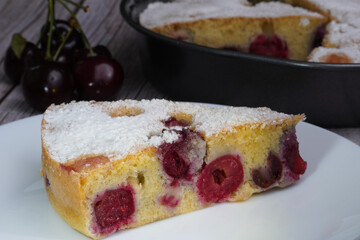 piece of cake with cherries closeup