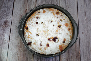 homemade cherry pie on a wooden board