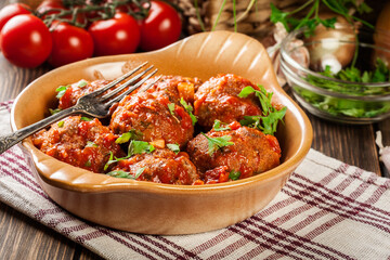 Pork meatballs with spicy tomato sauce in dish