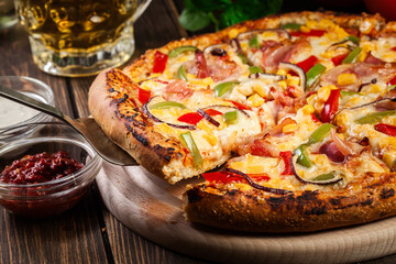 Homemade pizza with bacon, paprika and corn