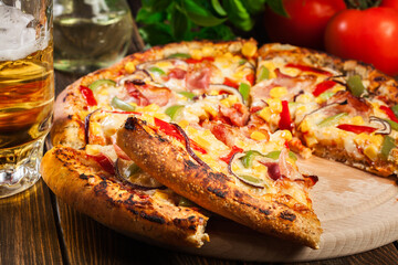 Homemade pizza with bacon, paprika and corn