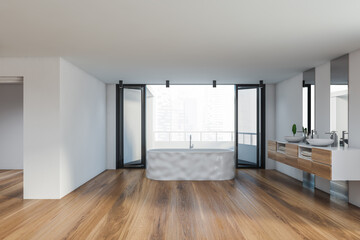 White master bathroom interior with balcony