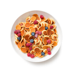Trendy food. Breakfast with tiny pancakes and fresh berries. isolated on white background