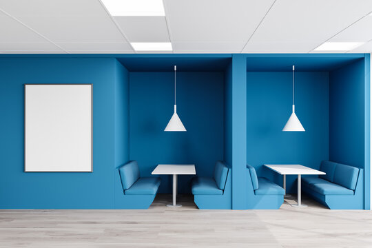 Bright blue diner interior with sofas and poster