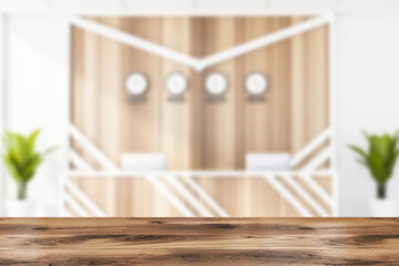 Table in blurry office with reception desk