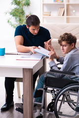 Father and disabled son in education concept