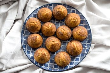 Delicious cupcakes on a blue plate