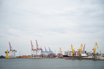 seaport where large containers are loaded on cargo ships