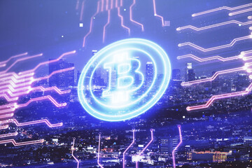 Multi exposure of cryptocurrency theme hologram drawing and city veiw background. Concept of blockchain and bitcoin.