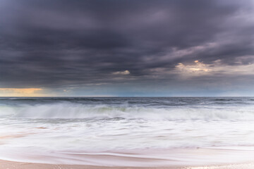 Sunrise Seascape and Rain Clouds