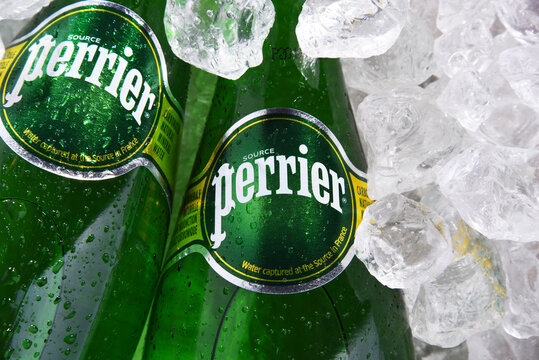 Bottles of Perrier mineral water in crushed ice