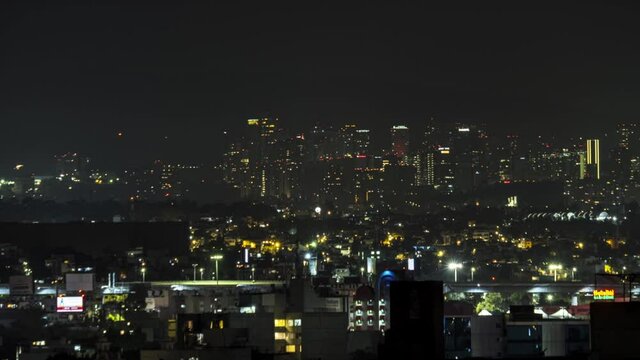 Motionlapse of Mexico City illuminated at night