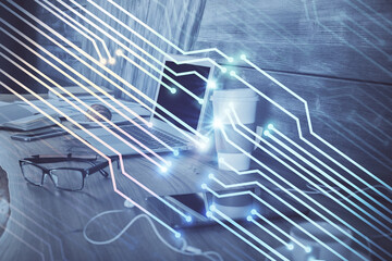 Double exposure of computer and technology theme hologram. Concept of freelance work.