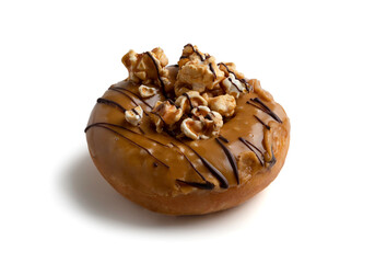 Donut topped with caramel. Isolated on white background