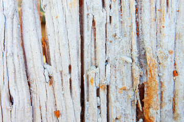 The wood surface is cracked.