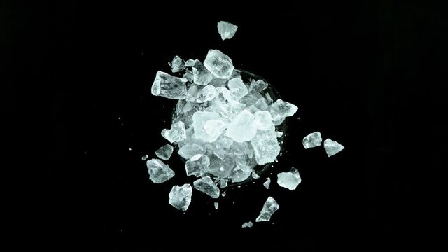 Super Slow Motion Shot of Exploding Crushed Ice Towards Camera at 1000fps.