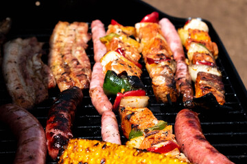 roasted grilled meat sausages pepper sweetcorn
