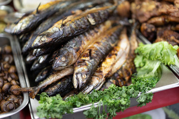 delicious food baked fish with salad
