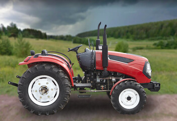 Red tractor on the field