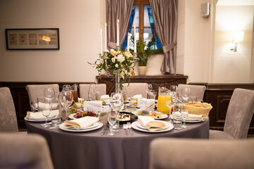 festive table with candles in a cozy restaurant
