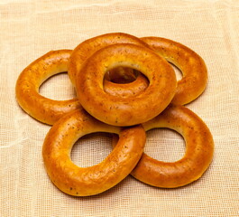 Russian bagels with poppy seeds on a beige napkin