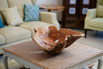 Wooden hand made house decoration on the table. Natural materials for home. Eco concept.