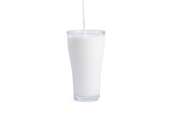 Glass of milk isolated on white background. Full glass of milk.